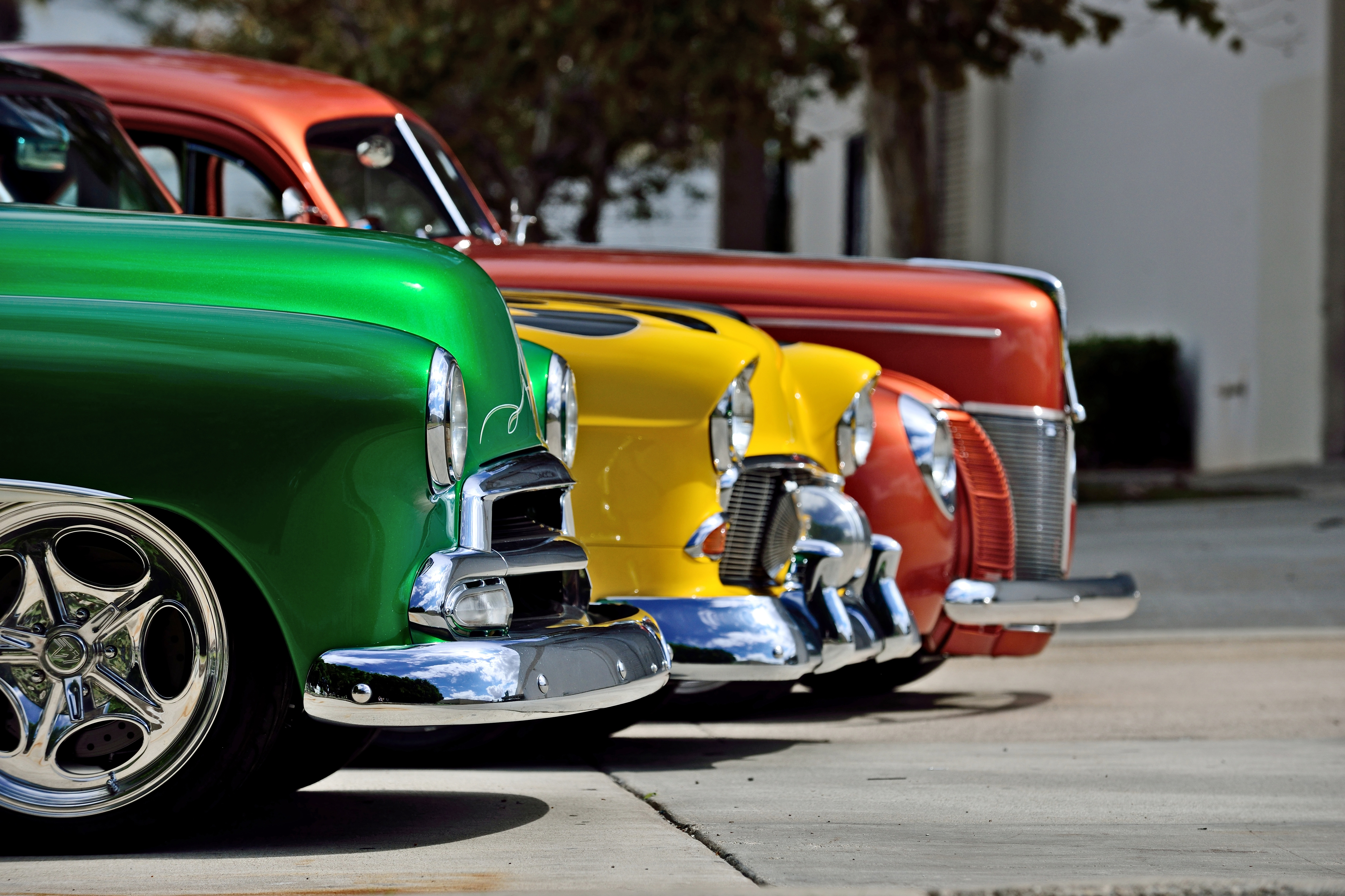 Nose shot of three classic cars