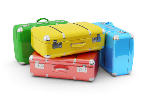 Four different colored suitcases