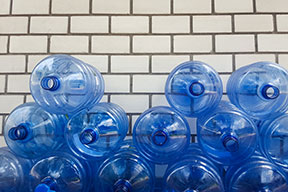 Gallon jugs of water stacked up